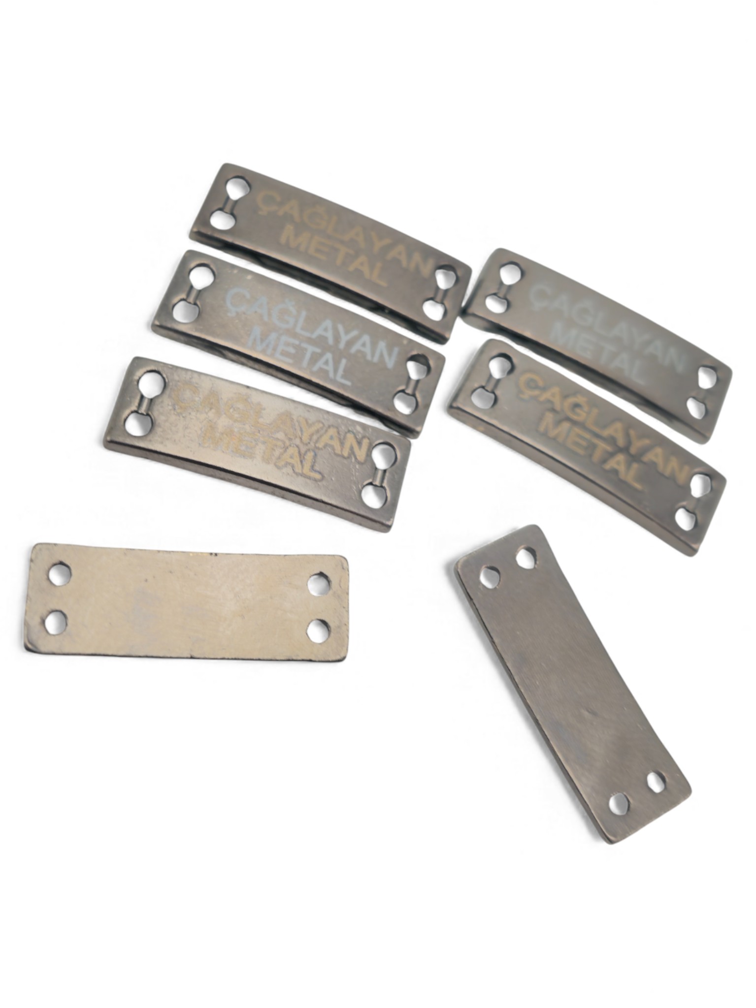 4-hole slightly curved sew-on label 21.5 mm x 7 mm