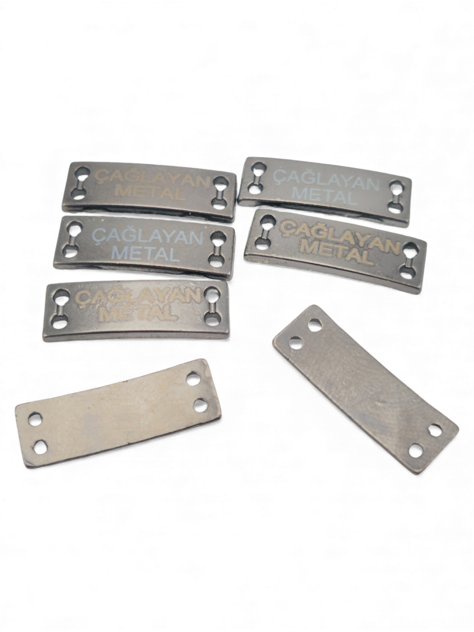 4-hole slightly curved sew-on label 21.5 mm x 7 mm