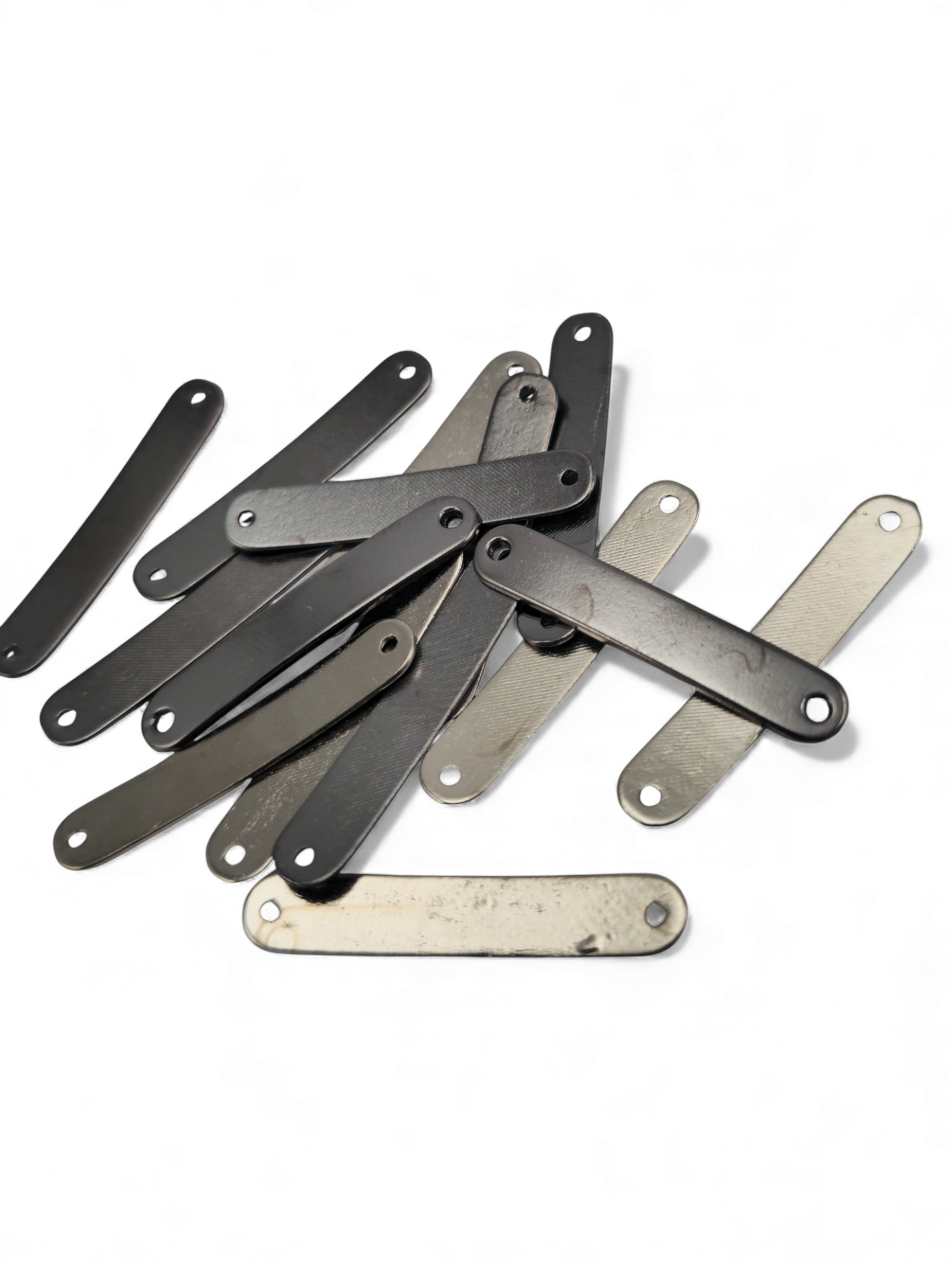 oval cornered, curved metal plate 29.2 mm x 5.3 mm