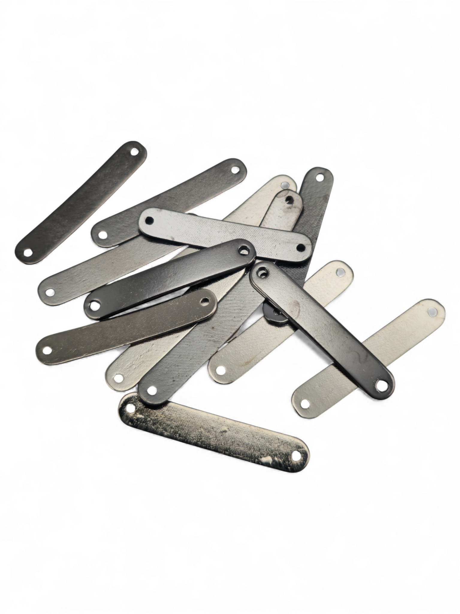 oval cornered, curved metal plate 29.2 mm x 5.3 mm