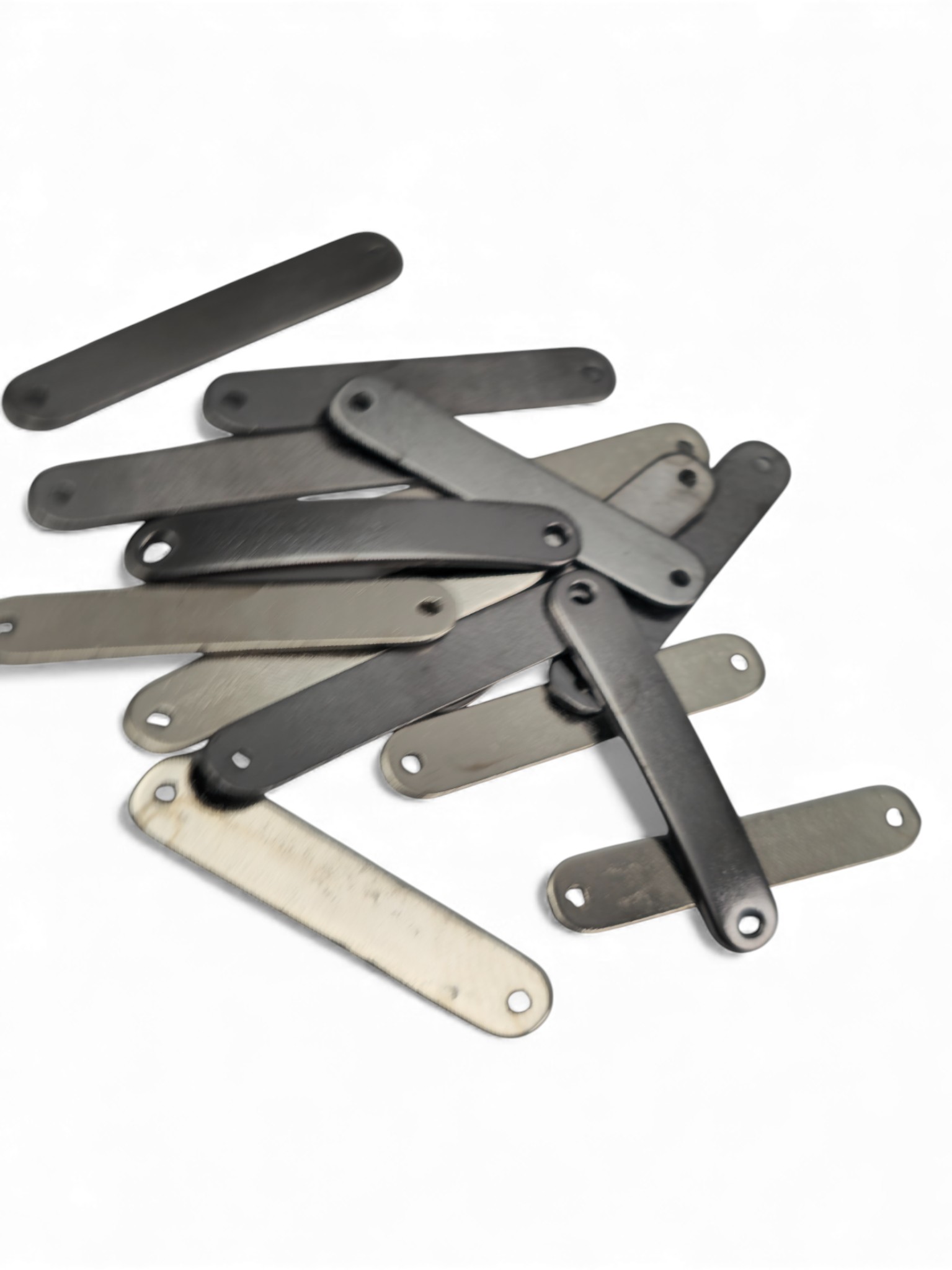 oval cornered, curved metal plate 29.2 mm x 5.3 mm