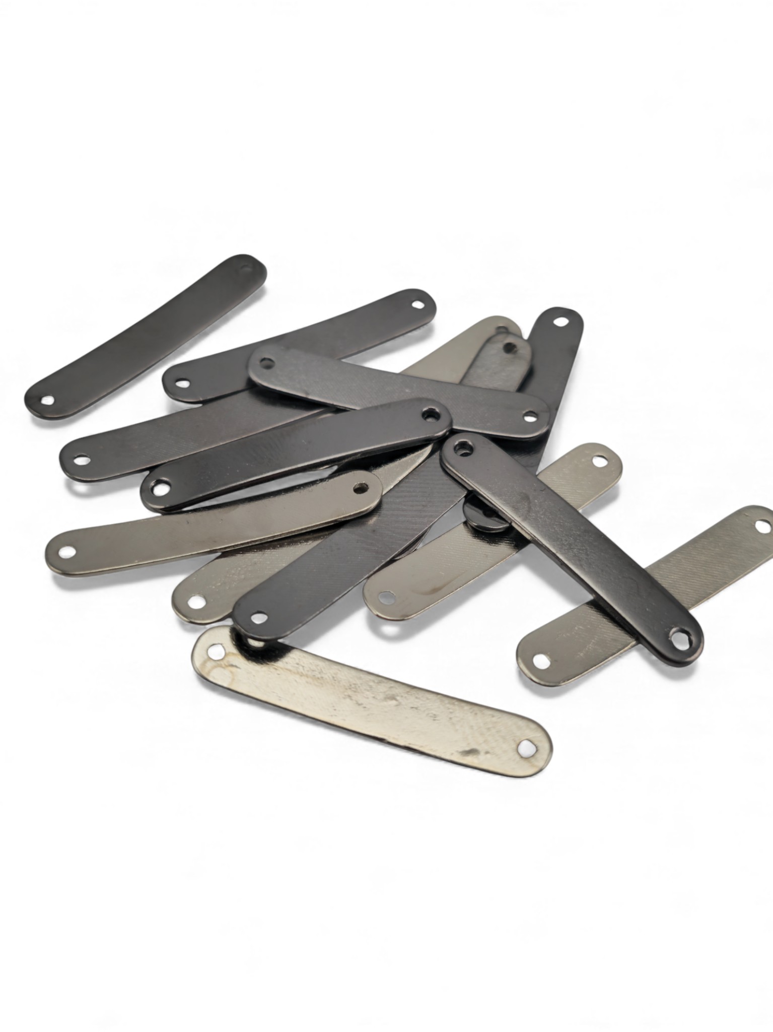 oval cornered, curved metal plate 29.2 mm x 5.3 mm
