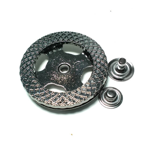 Round and patterned metal studs button diameter 38 mm Round and patterned metal studs button diameter 38 mm